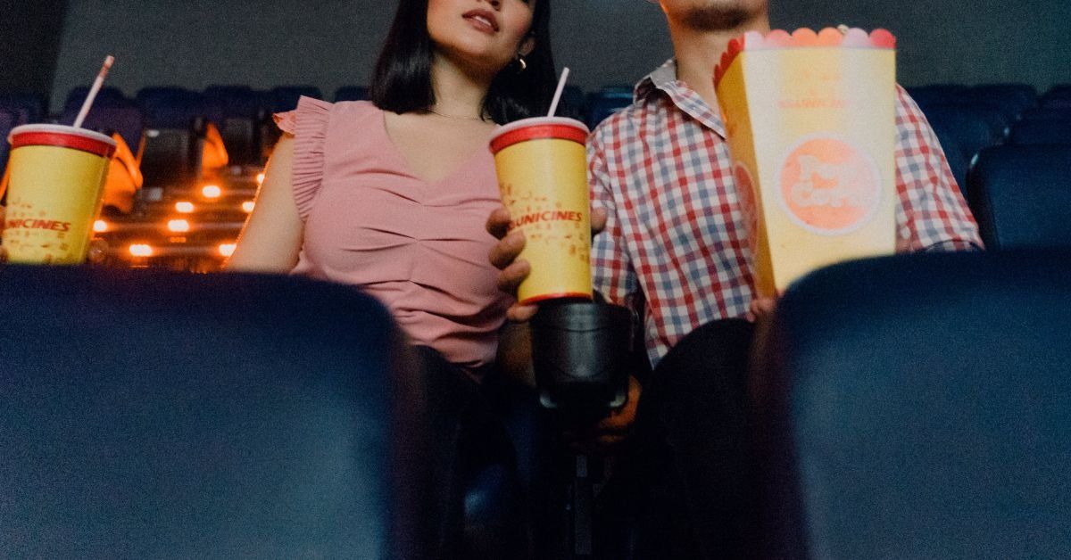 A couple sitting in a movie theater