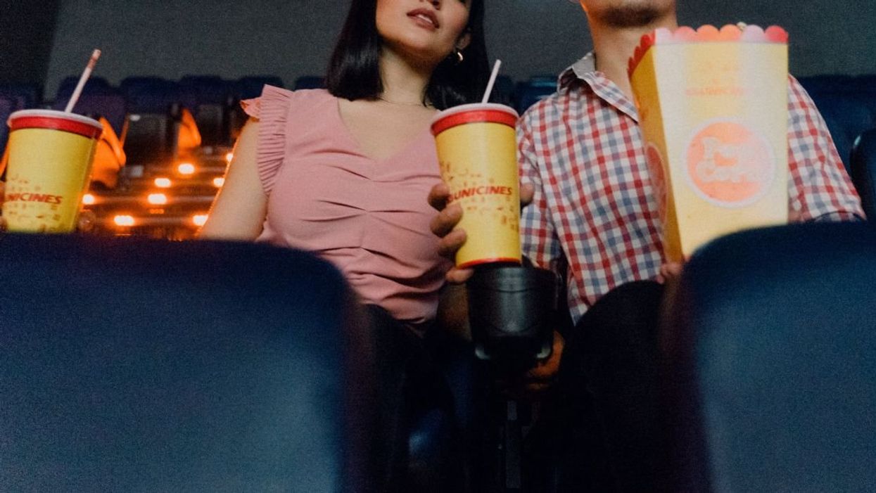 A couple sitting in a movie theater