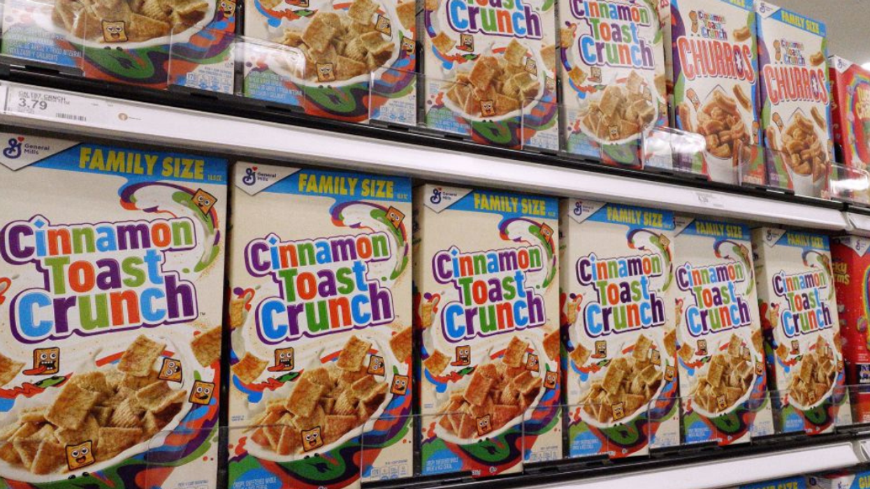 A grocery aisle shelf of Cinnamon Toast Crunch