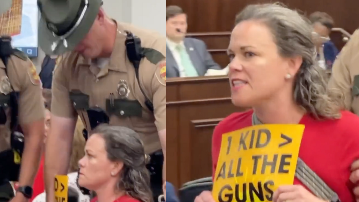 A gun safety activist is removed froma Tennessee House subcommittee meeting