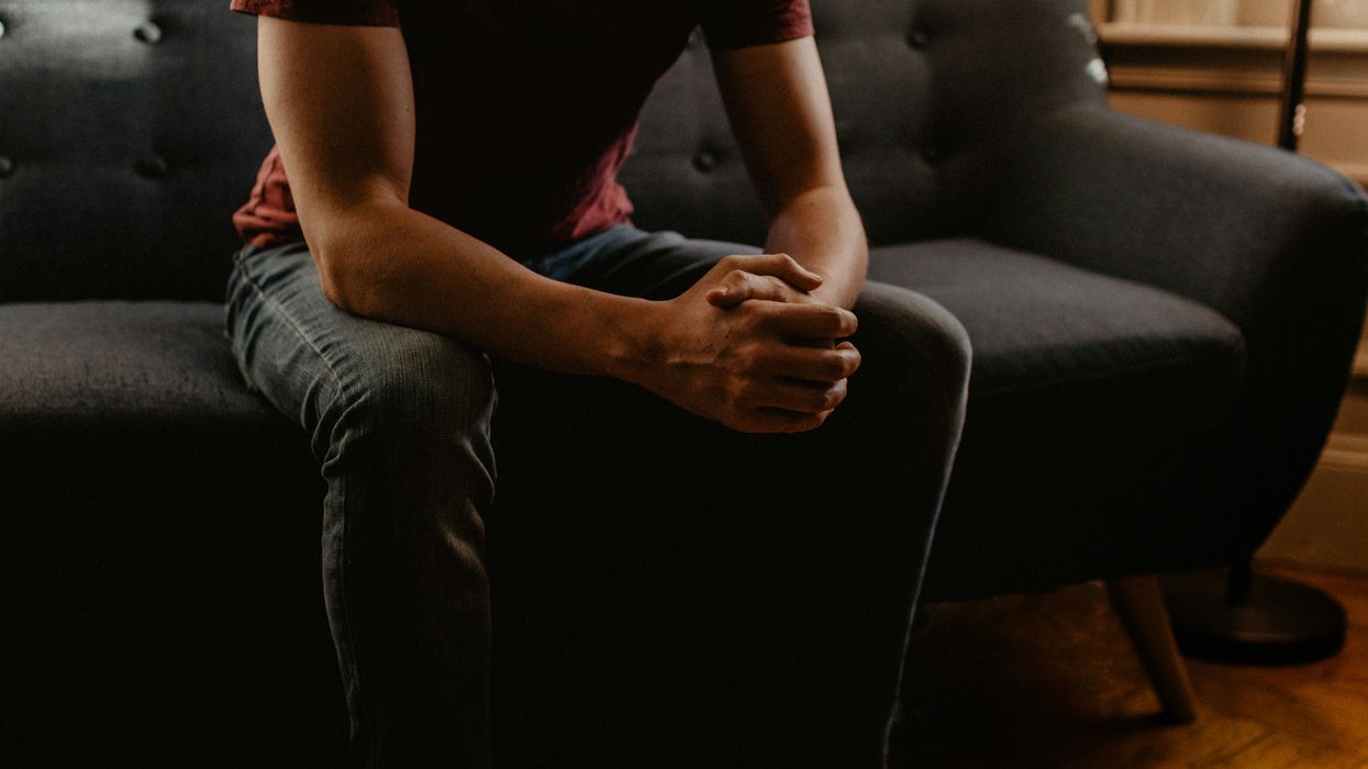 A man sitting on a couch