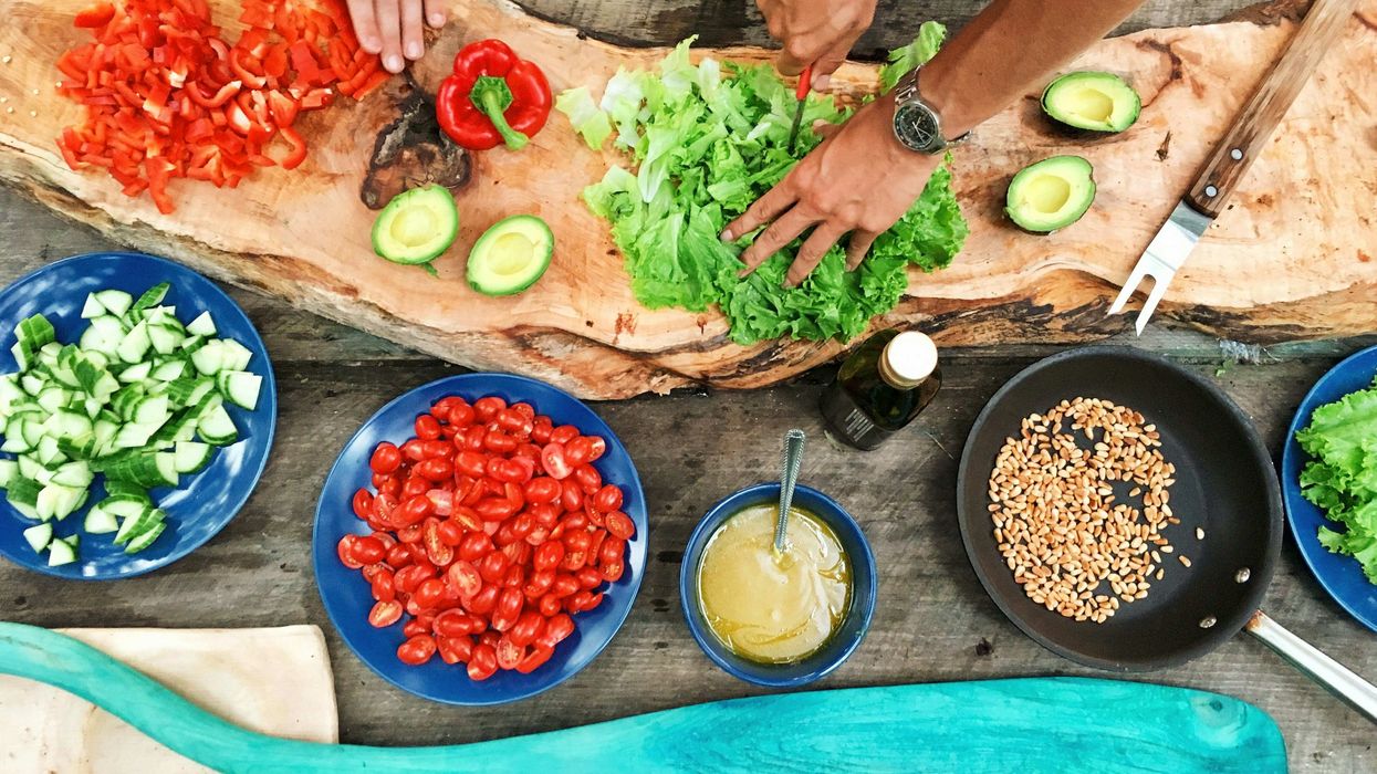 A person cooking with a mis en place