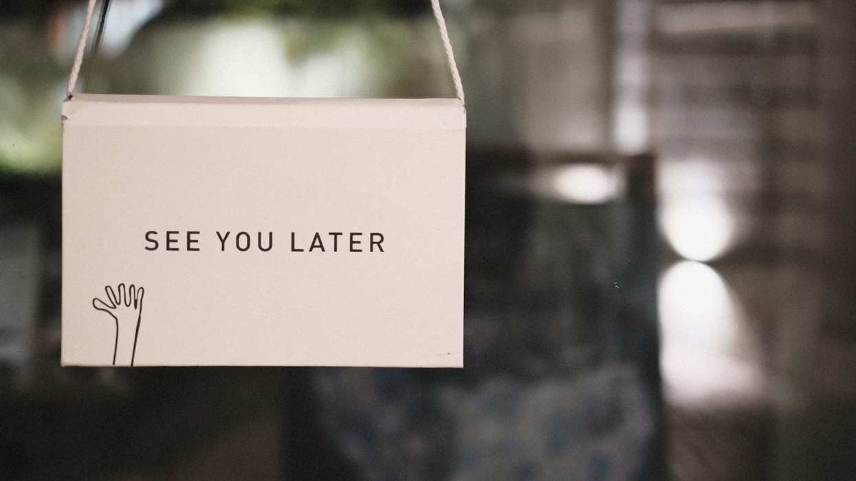 A photo of purse with "See you later" and a waving hand