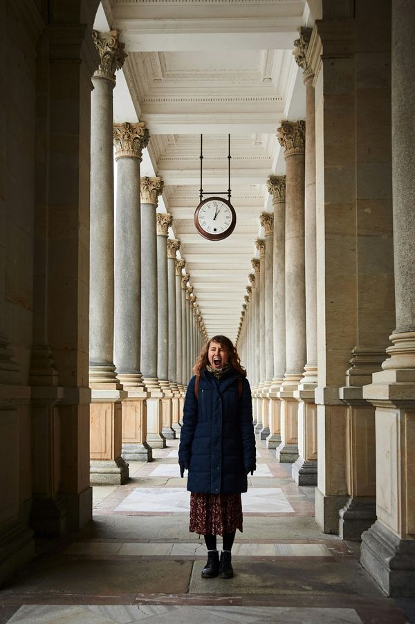 A woman screaming in a pathway