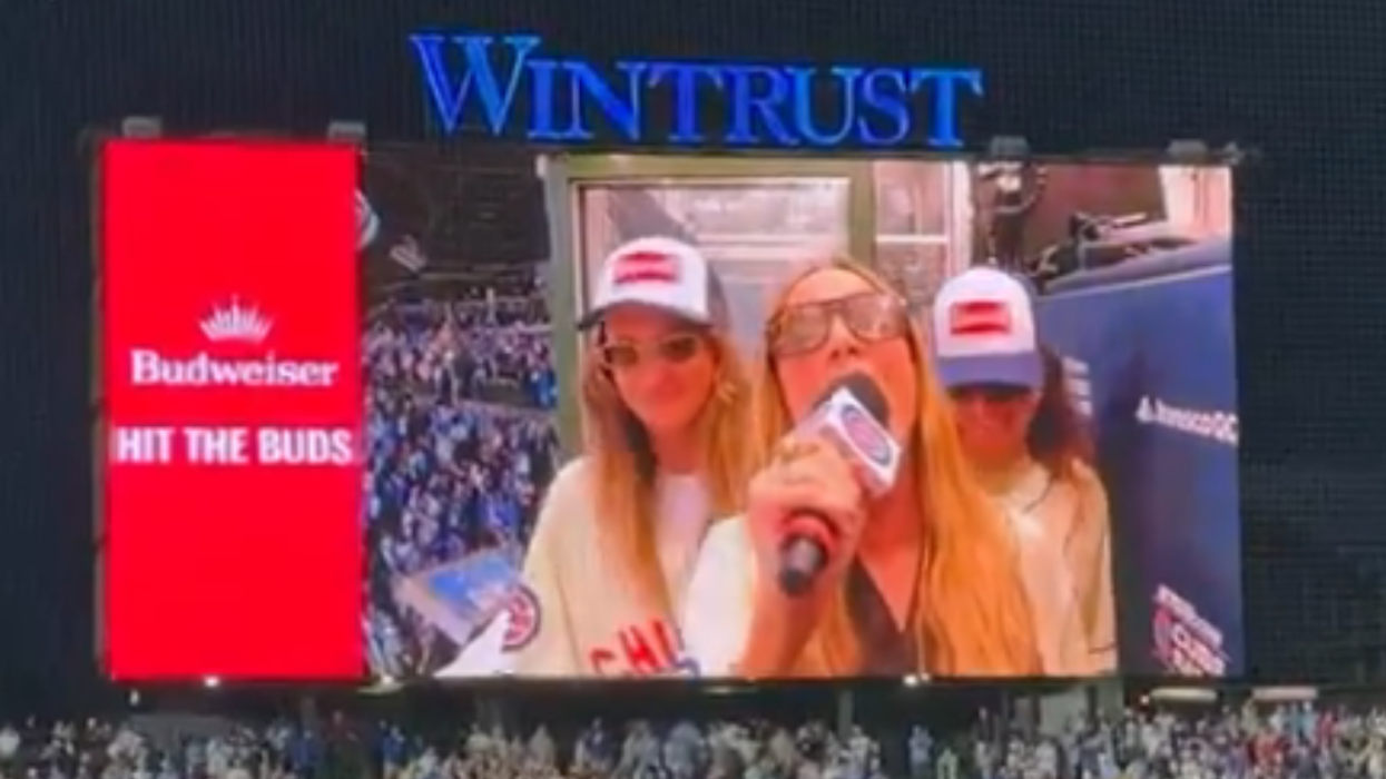 Alex Cooper singing 'Take Me Out to the Ballgame'