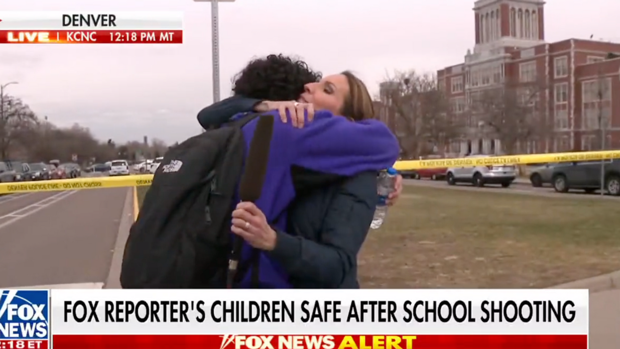 Alicia Acuña hugs her son on air after realizing he was safe after a school shooting