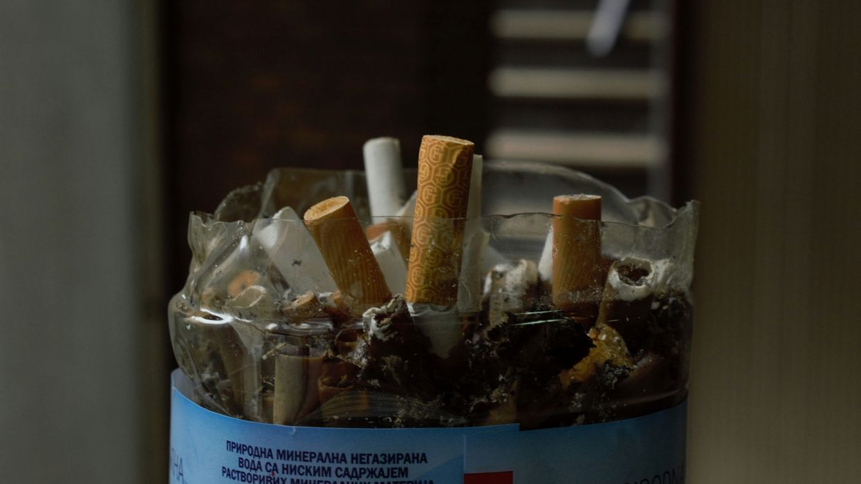 An ashtray full of used cigarettes