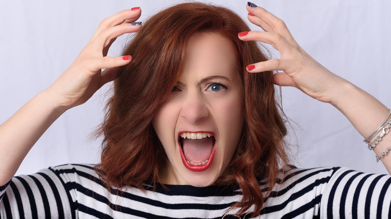angry girl in black and white striped shirt