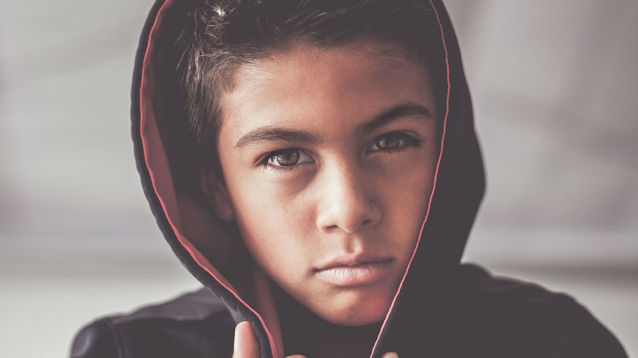 Angry kid wearing a hoodie