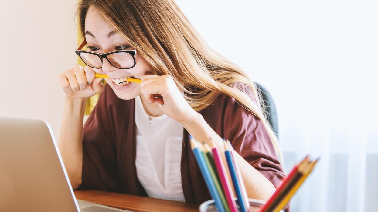 Angry woman at computer.