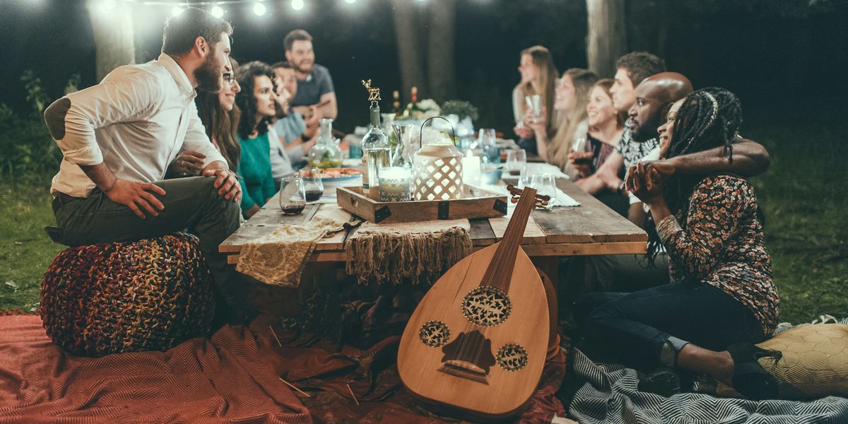Backyard family dinner with instruments