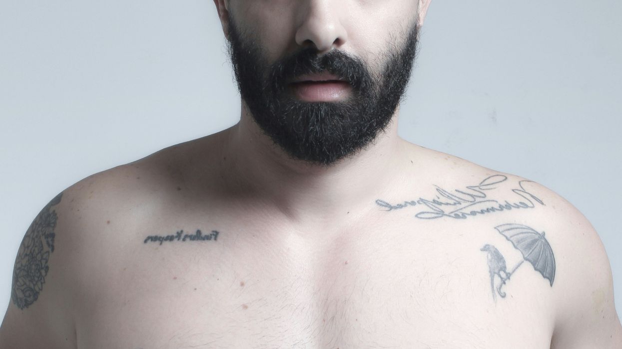 bearded man's nude torso