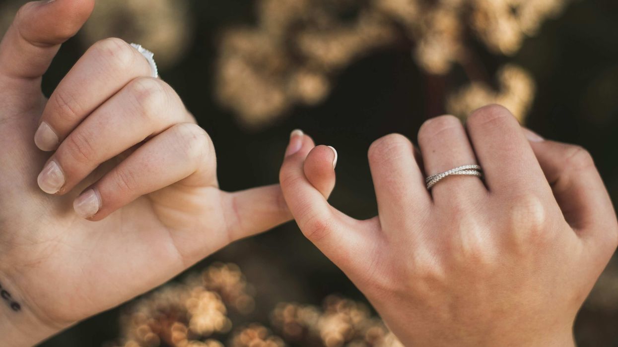Best friends sharing a pinky promise