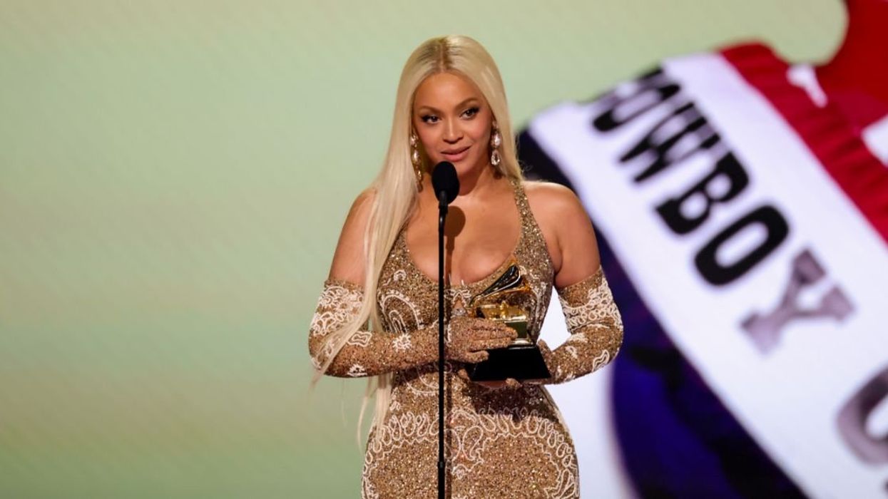 Beyoncé accepts the Best Country Album award.