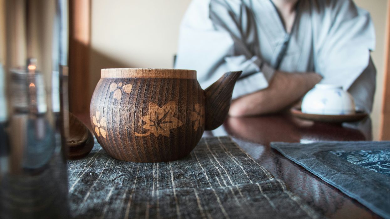 brown and beige floral teapot on tabletop