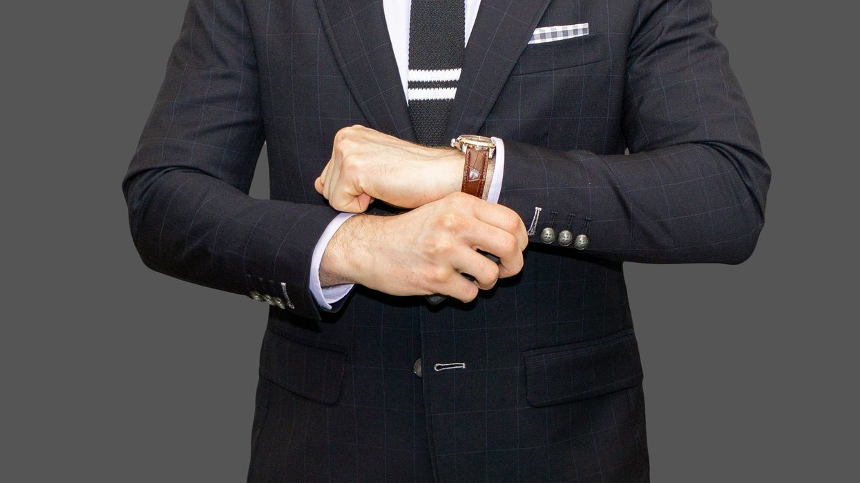 Business exec wearing plaid custom blazer