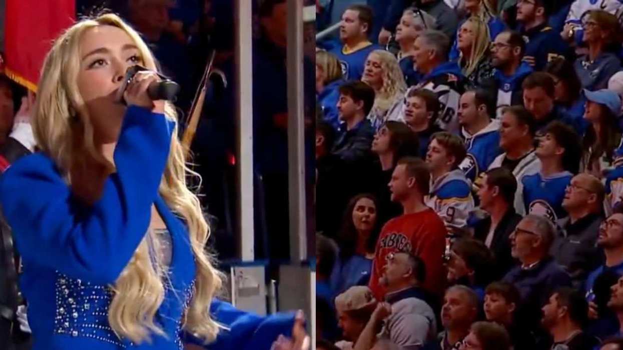 Cami Clune sings O Canada as Buffalo Sabres fans join in after her microphone cuts out at KeyBank Center.