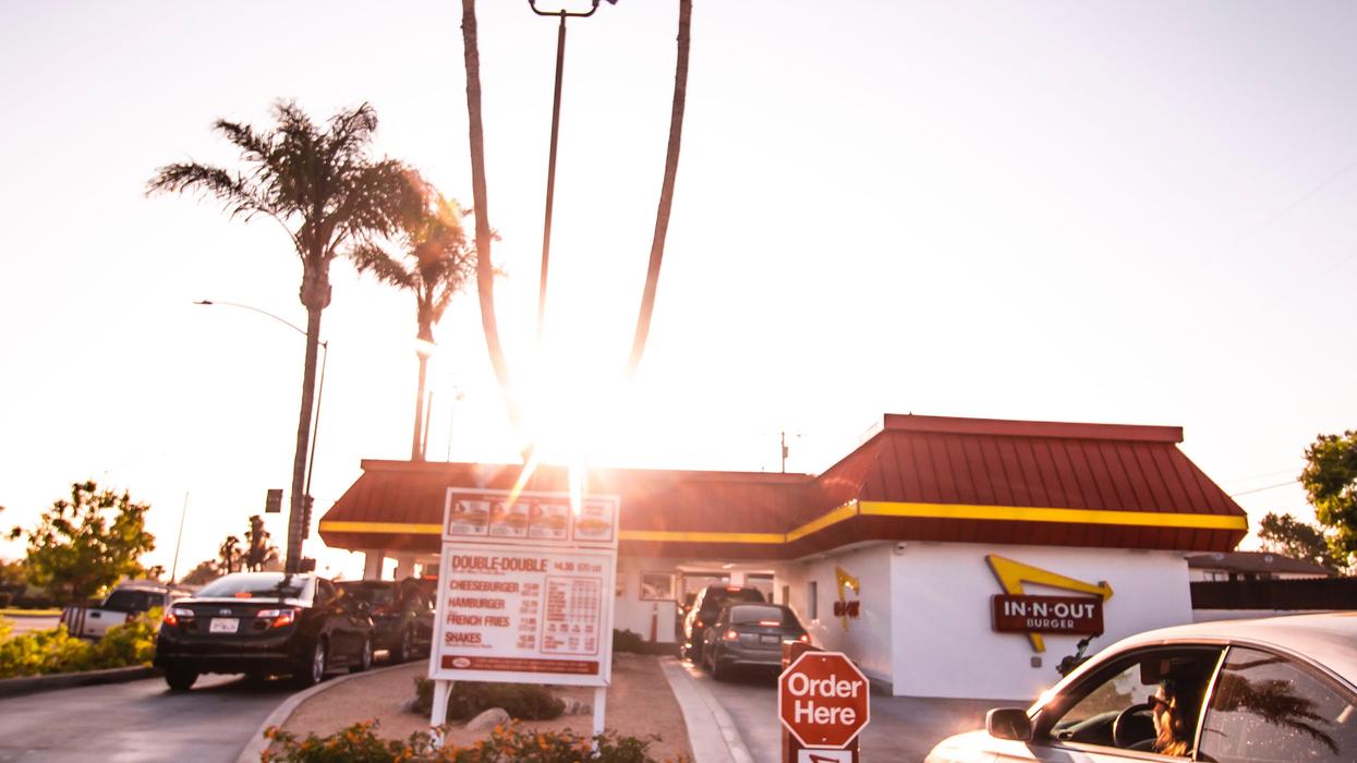 Car at an In-N-Out Burger drive-thru