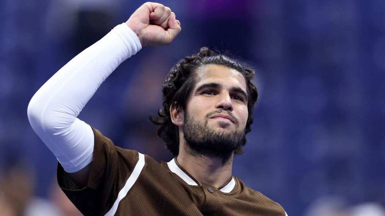 Carlos Alcaraz of Spain celebrates defeating Jaime Faria of Portugal in the Men's Singles Second Round.