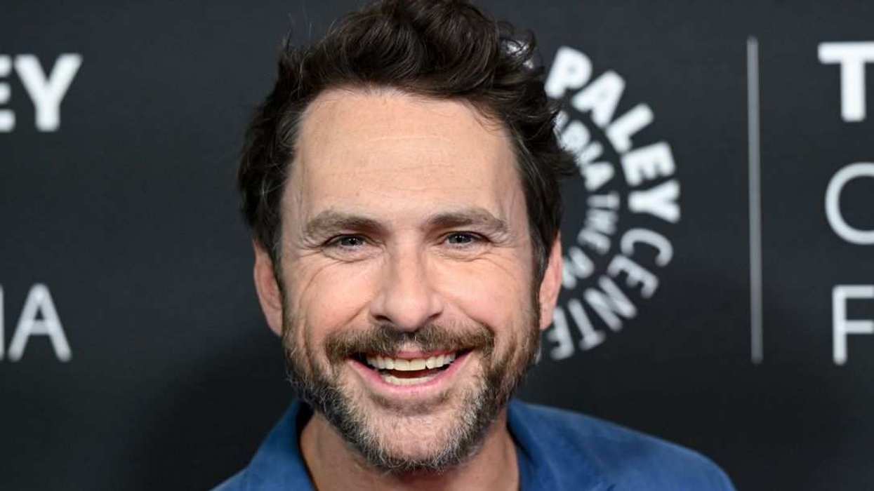 Charlie Day smiles on the red carpet during a Paley Center event appearance.