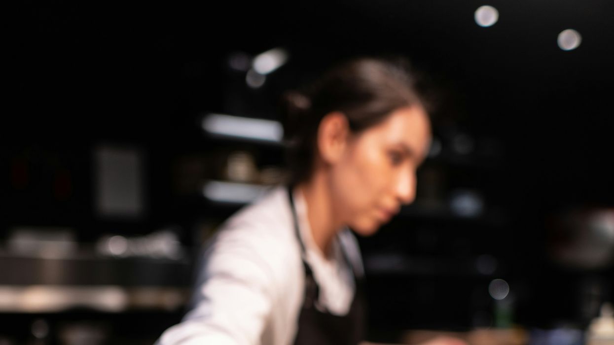 Chef preparing dishes for serving