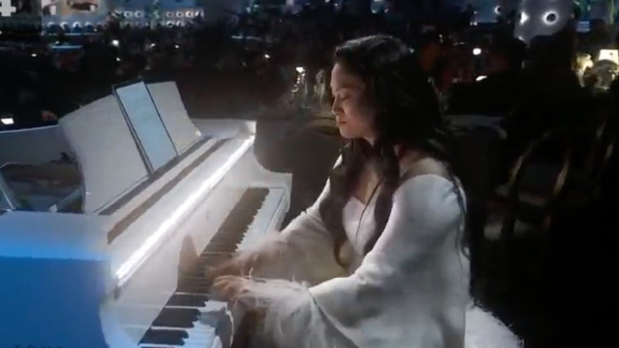 Chloe Flower playing piano