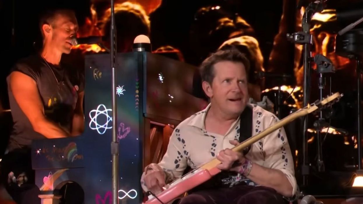 Chris Martin at the piano and Michael J. Fox on guitar