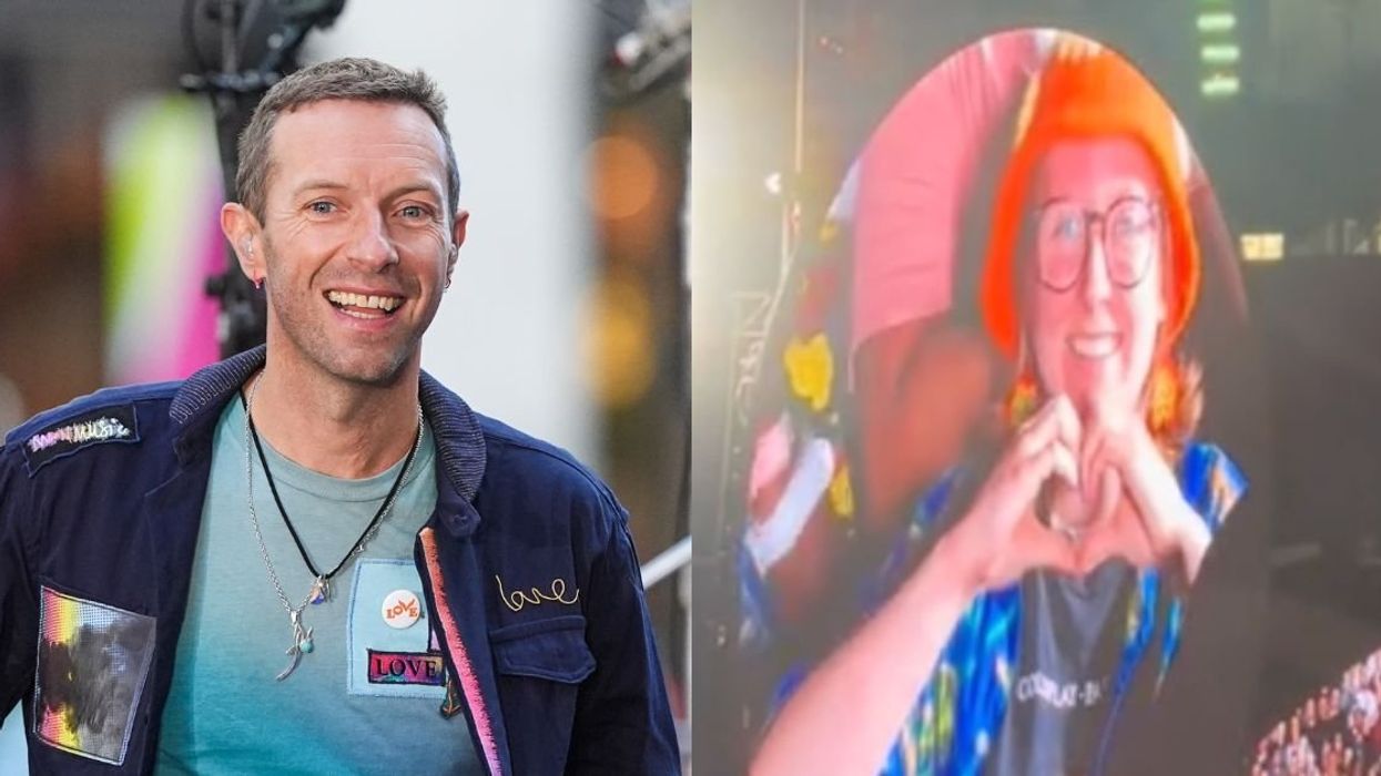 Chris Martin, concertgoer making heart hands