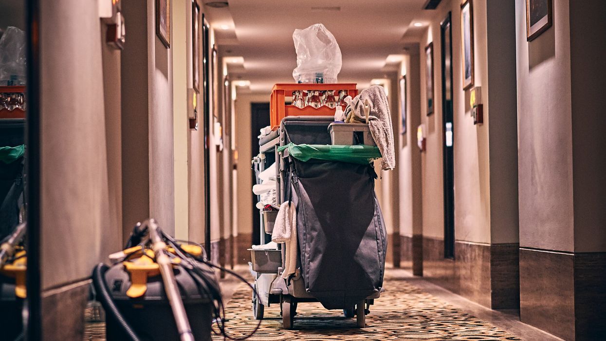 Cleaning equipment in hotel hallway