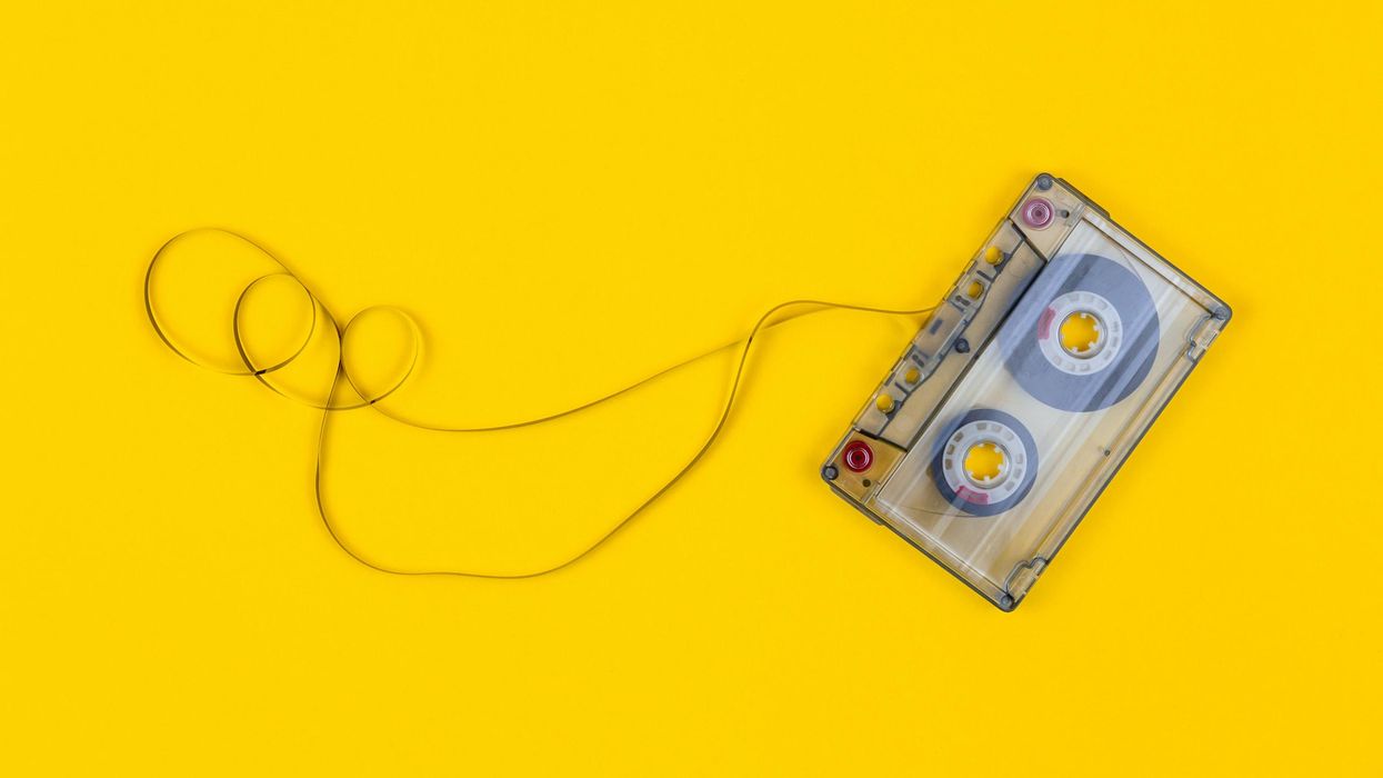 Clear cassette tape with ribbon pulled out