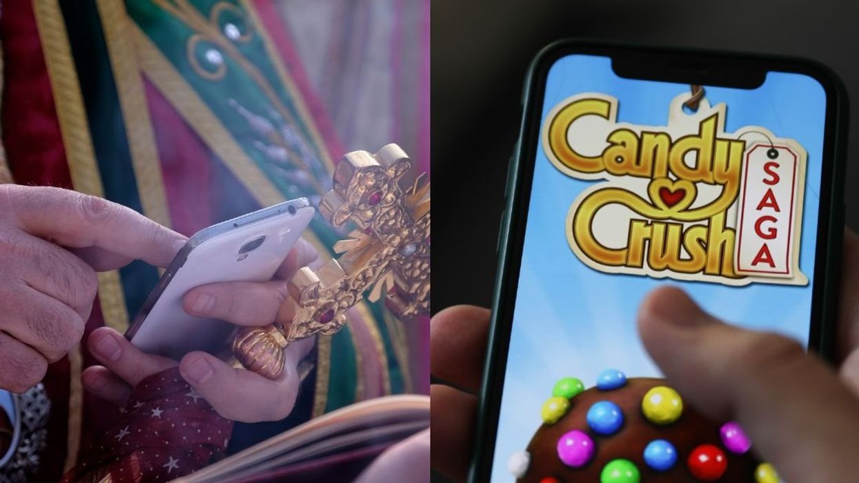 Cleric using a smartphone; Candy Crush logo on smartphone screen