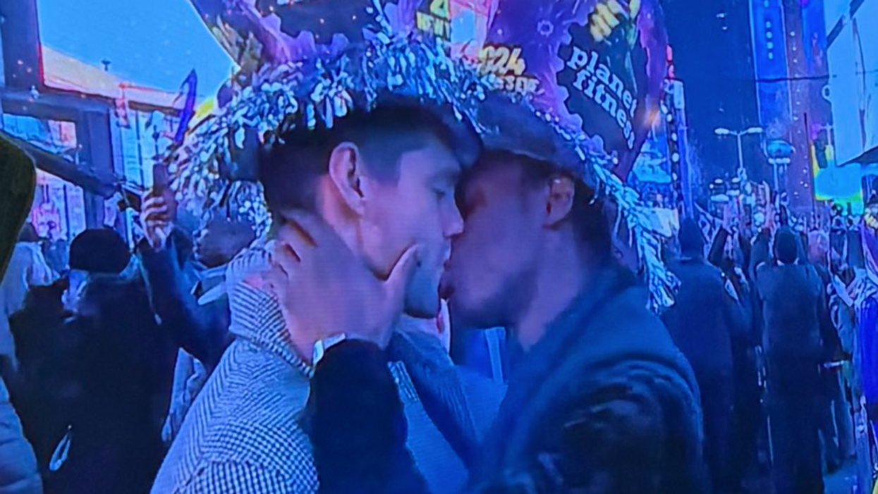 CNN screenshot of gay couple kissing during the New Year's Eve ball drop