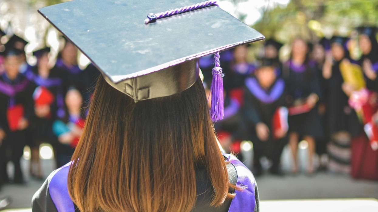 college graduates in caps and gowns