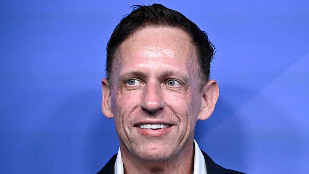 Conservative political activist Peter Thiel arrives on the red carpet for the Axel Springer Award in Berlin.