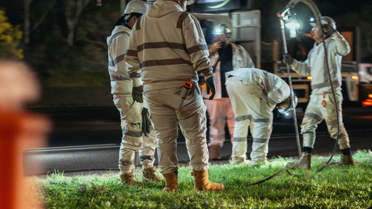 Construction workers working at night