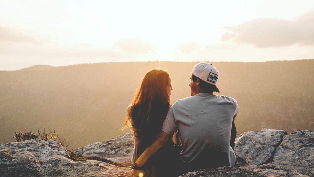 Couple overlooking a breathtaking nature view
