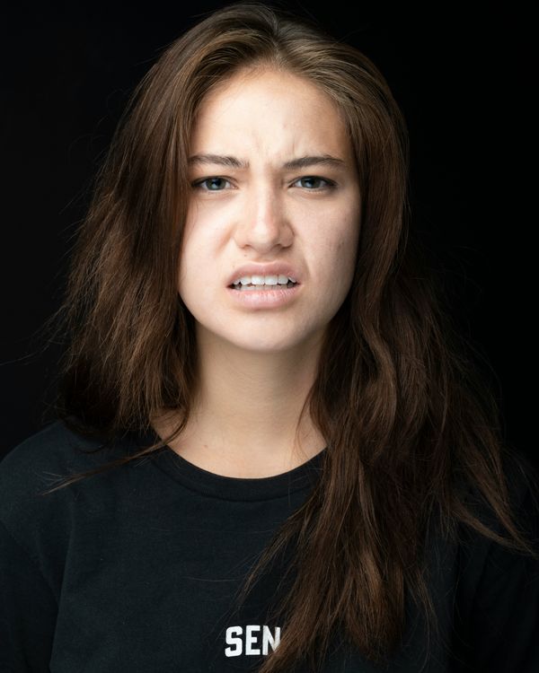 Cringing woman