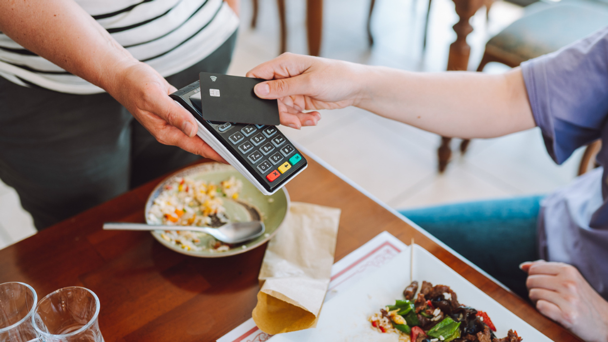 Customer paying for restaurant meal