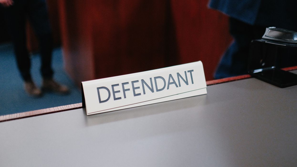 'Defendant' placecard in a courtroom