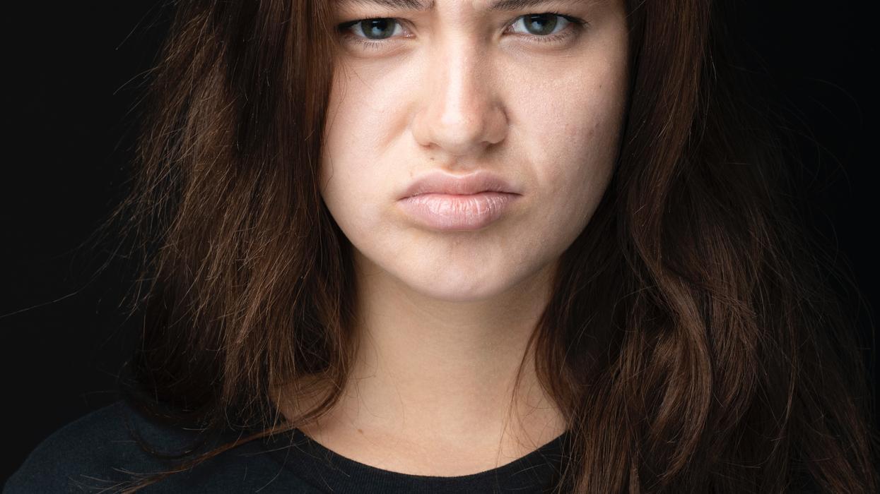 Disappointed woman pouting