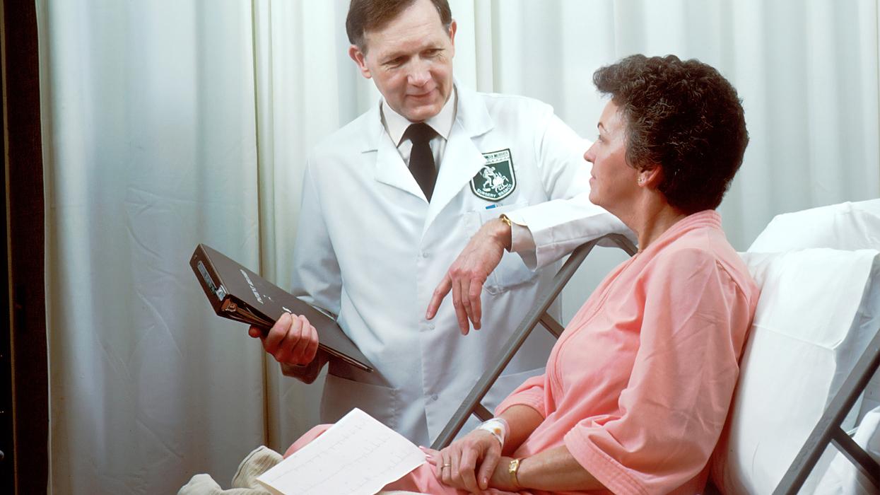 Doctor consulting with patient