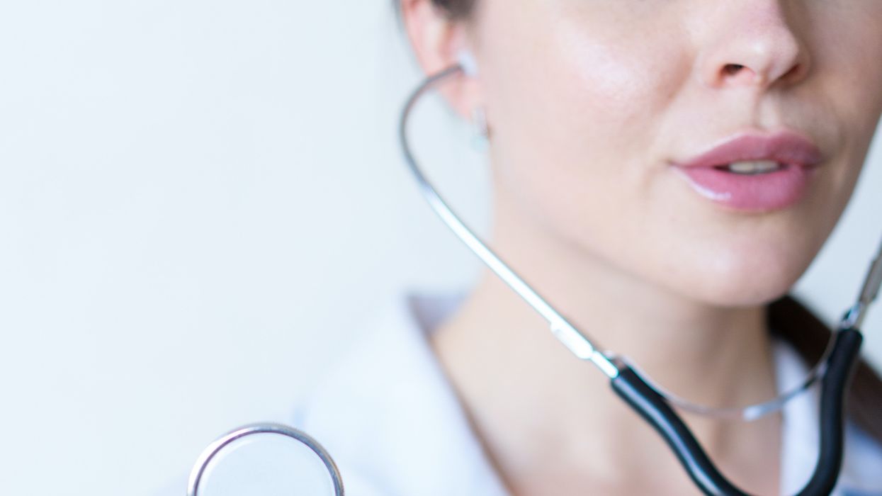 Doctor holding up a stethoscope