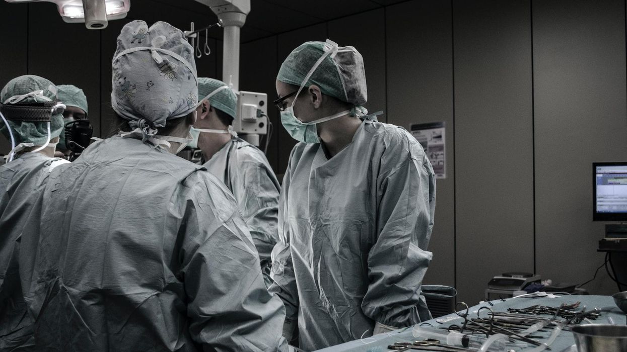 Doctors operating