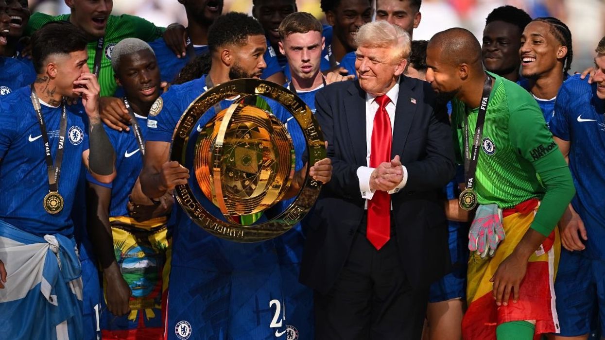 Donald Trump awkwardly crashes the award presentation ceremony at the 2025 FIFA World Cup.