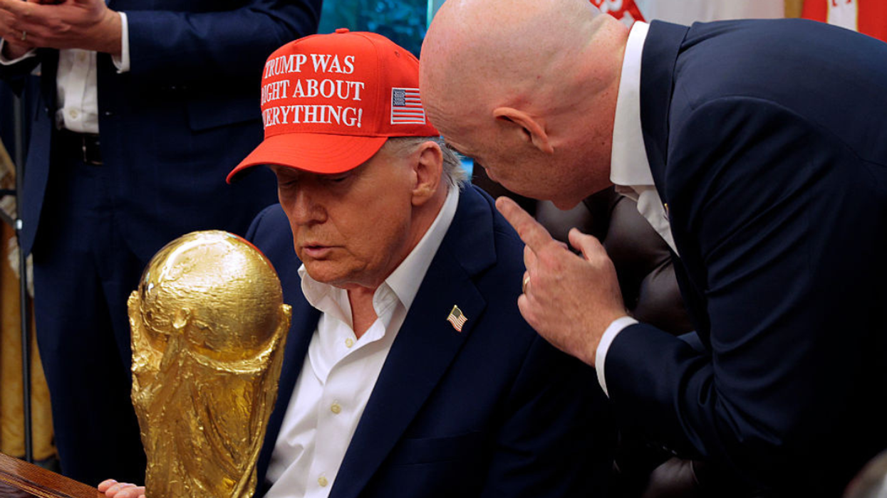Donald Trump holding World Cup