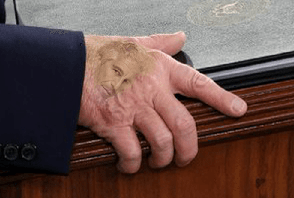 Donald Trump's discolored hand during his State of the Union address, with Jeffrey Epstein's face superimposed