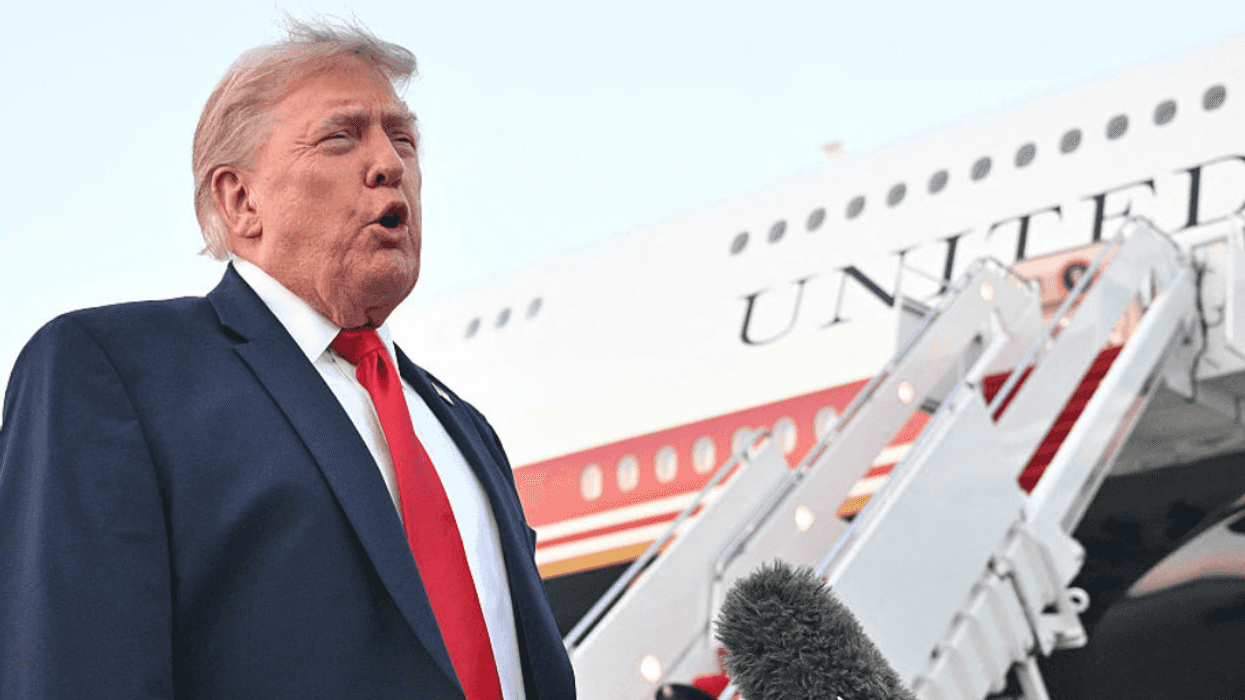 Donald Trump standing before. Air Force One
