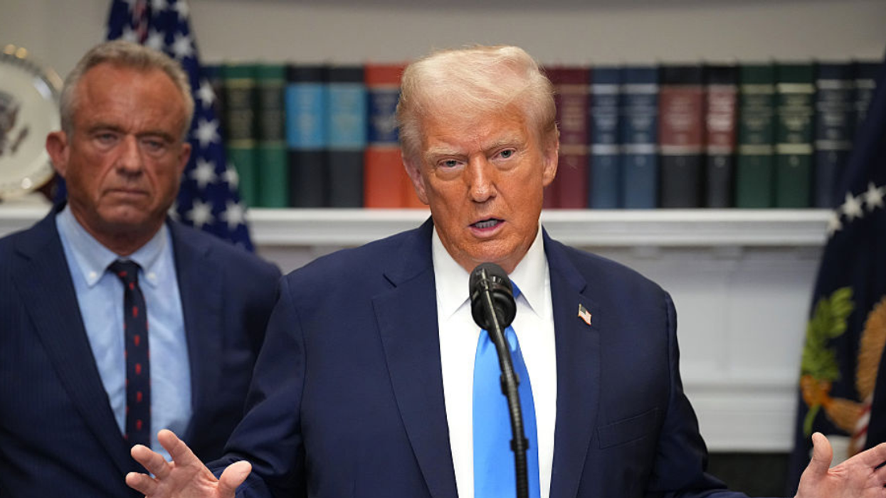 Donald Trump with Robert F. Kennedy Jr. in the background