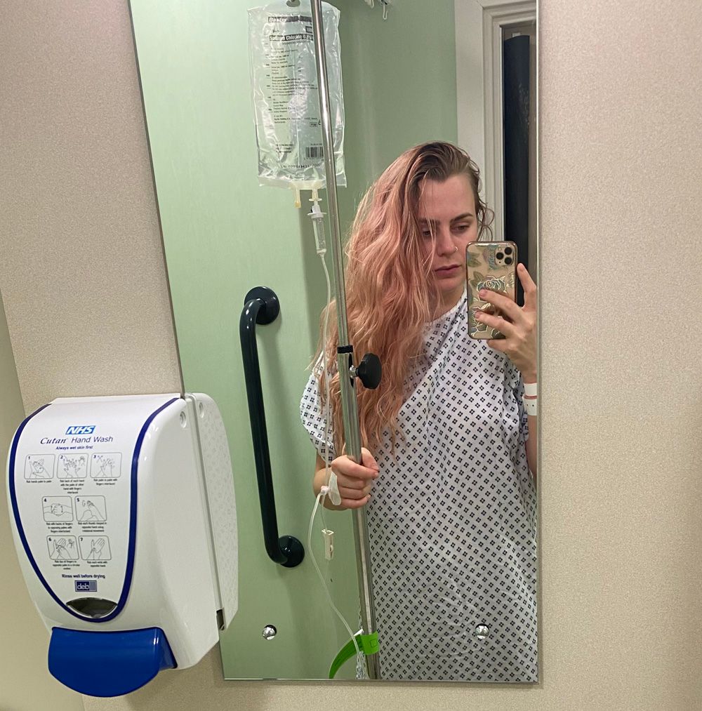 Woman standing in hospital bathroom