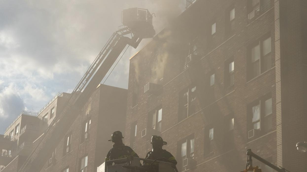 Firemen at a burning building